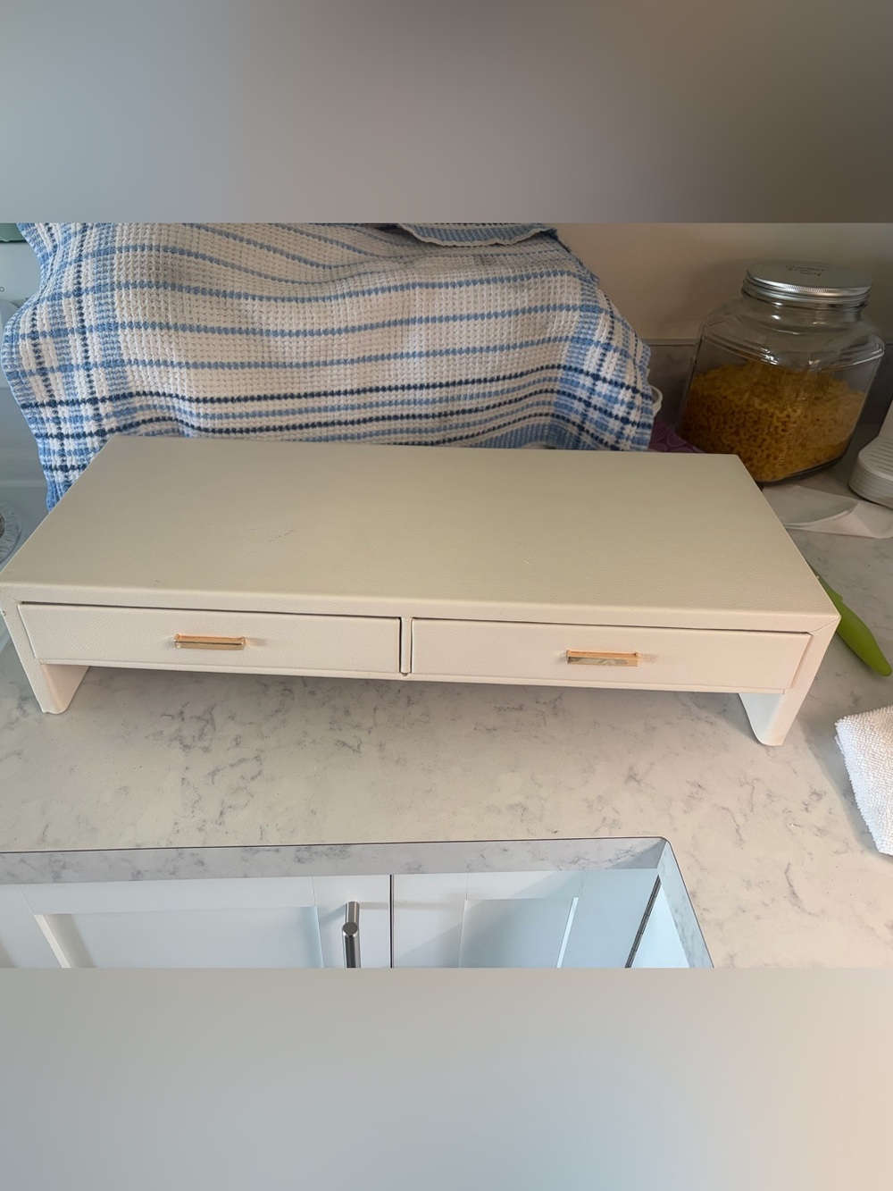 Neutral Cream with Gold Handles storage centre .
